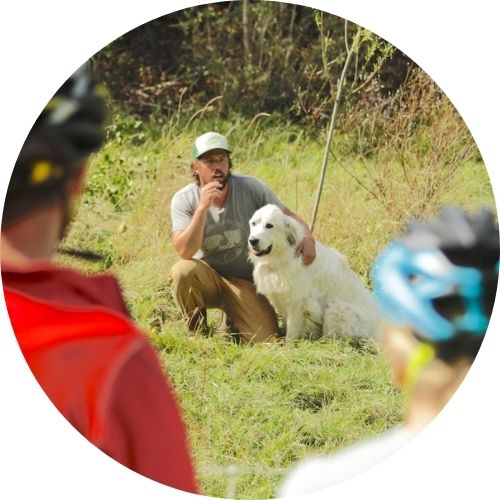 Adam from Barred Owl Brook Farm and his dog.